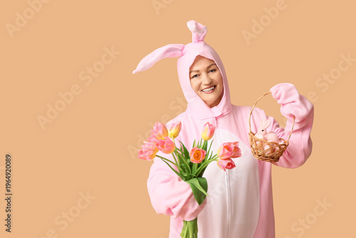 Funny senior woman in bunny...