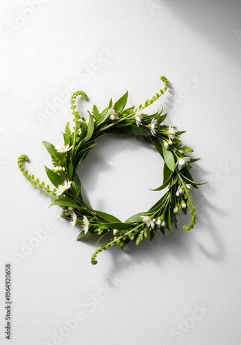 Intricate floral arrangement featuring verdant leaves and tiny flowers