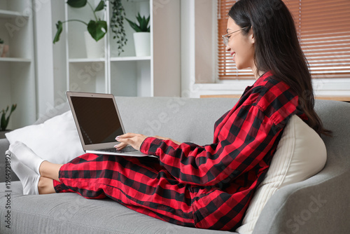Female freelancer in plaid ...