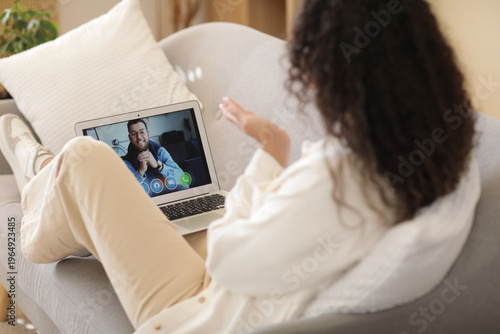 Young  woman video chatting...