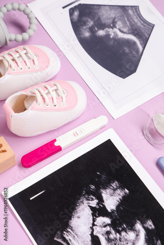 Composition with baby shoes...