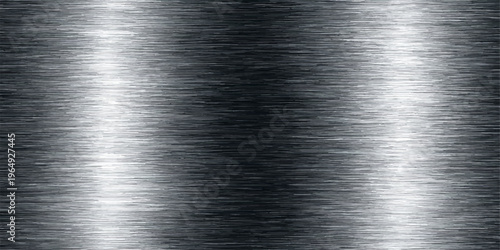 A polished silver stainless steel sheet features a brushed metal texture on an industrial aluminum plate surface with a shiny grey metallic pattern and subtle reflection