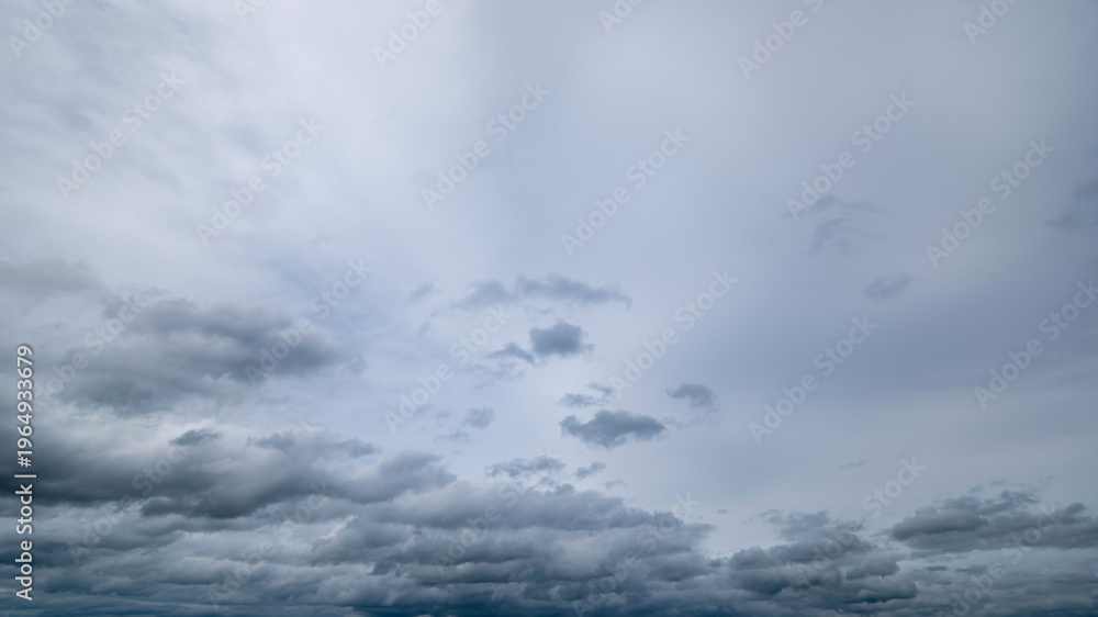 Obraz premium Dark sky with stormy clouds. Dramatic sky rain,Dark clouds before a thunder-storm,clouds before rain