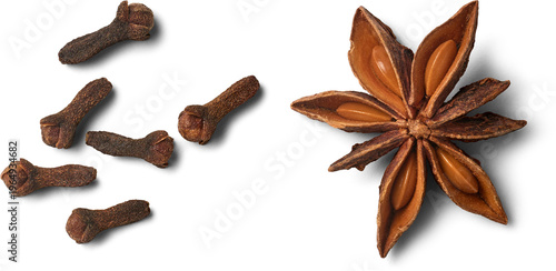 Canvastavla scattered dried cloves and star anise seed pod isolated white background, aromat