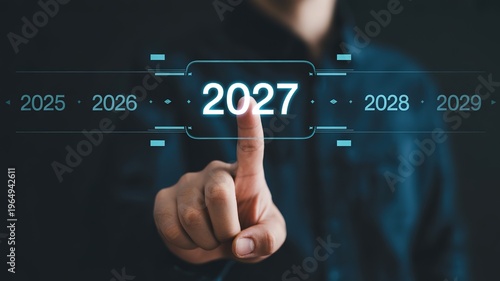 New Year 2027 Futuristic Holographic Interface with Finger Tapping Glowing Blue Digital Timeline for Tech Themed Presentations and Corporate Vision Concepts