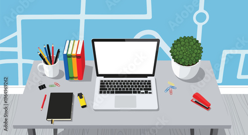A cluttered office desk with laptop, plant, and stationery items on it indoors