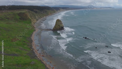 View of southern Oregon coast with large rock in ocean