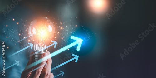 Canvastavla Innovation manager generating creative ideas with glowing light bulb ,rising arr