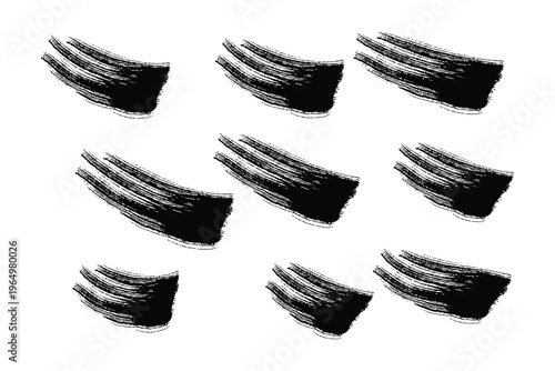 A collection of nine identical black and white abstract shapes arranged in three rows on a plain white background
