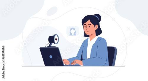 Woman in blue suit using laptop and webcam for online meeting or video call, remote work