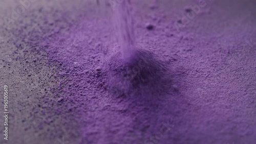 Purple powder explosion forming abstract vibrant pattern concept. Close up of vibrant purple pigment powder texture with fine particles and rich color intensity
