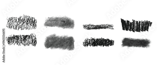 Charcoal textures and brush strokes isolated on white background for design.
