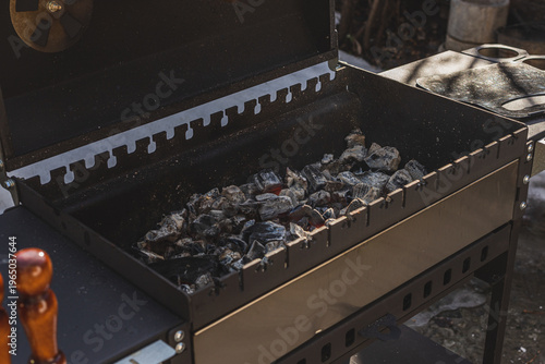 Hot coals are in the grill