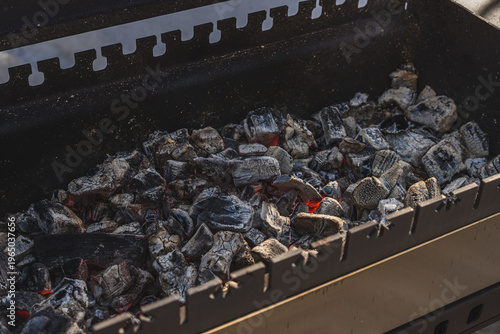 Hot coals are in the grill