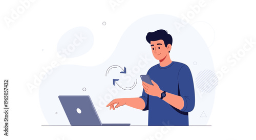 Man using laptop and smartphone for data synchronization and transfer