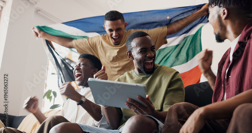 Fotografie Soccer game, celebration and men in lounge, tablet and excited for score victory