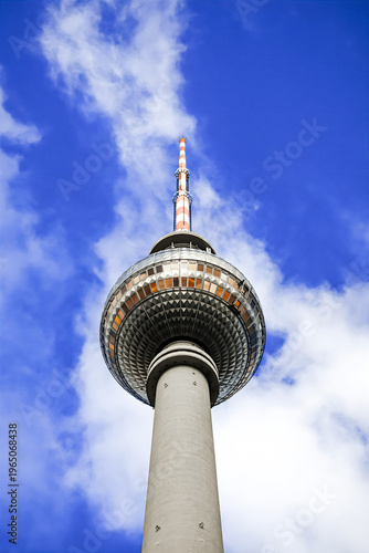 Telecommunications Tower with Spherical Top Against Blue Sky