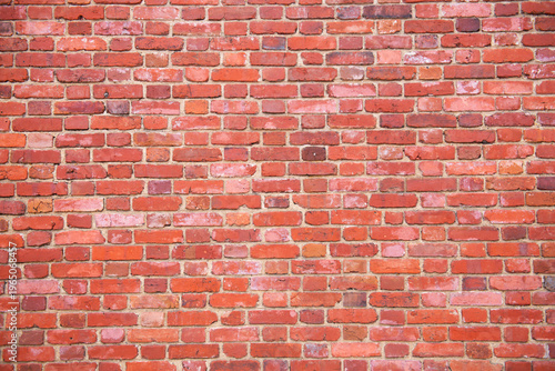Bricks on wall texture. Bricks in masonry pattern. Bricks on redbrick surface. Bricks in rustic background.