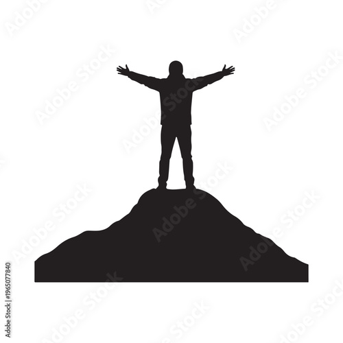Man standing on mountain peak with arms outstretched in triumph silhouette