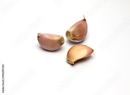 Garlic cloves on a white background