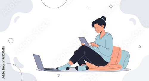 Young Woman Working Remotely with Laptop and Tablet, Comfortable Home Office Setup