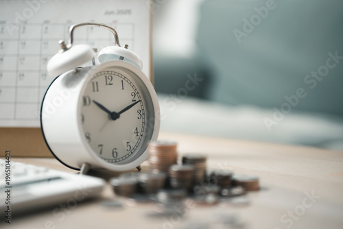 Canvastavla Alarm clock with coins and planner representing time-based budgeting, savings goals, and financial planning for effective money management