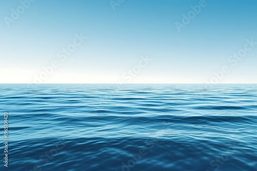 Vast open ocean with gentle waves under a clear blue sky