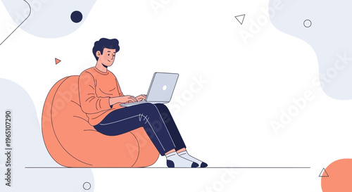Young Man Working on Laptop While Relaxing on Orange Bean Bag Chair