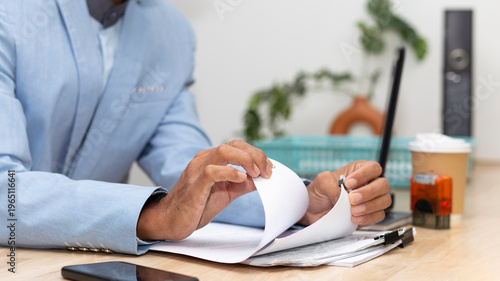 businessman work at workplace and busy with document 