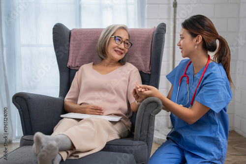 Canvas Print Healthcare interaction nurse engaging with elderly patient in home environment c