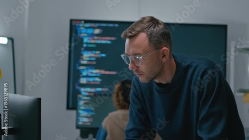 software engineers team developing autonomous AI agents and agentic terminal coding in a cowork environment.Concept of constitutional AI,agentic coding,large language models and reinventing software.
