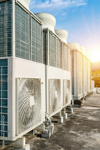 Commercial air conditioning units lined up on rooftop