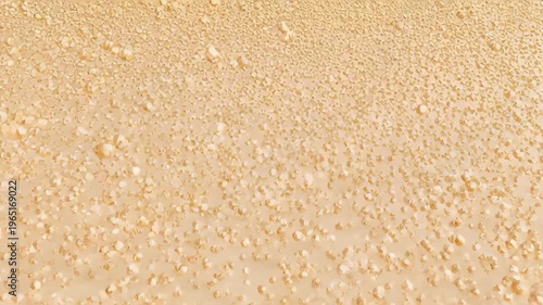 Raindrops on glass surface creating abstract pattern