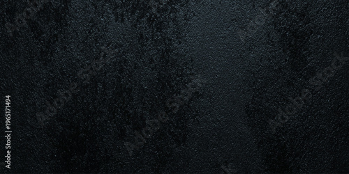 Dark black wall textured background with rough black surface and subtle gradient
