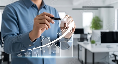 Businessperson upward arrow with houses on digital overlay in office
