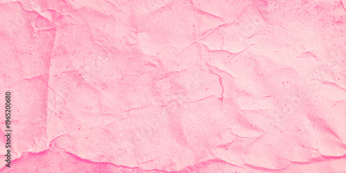 Pink crumpled paper texture background with soft folds and creases for design and decoration