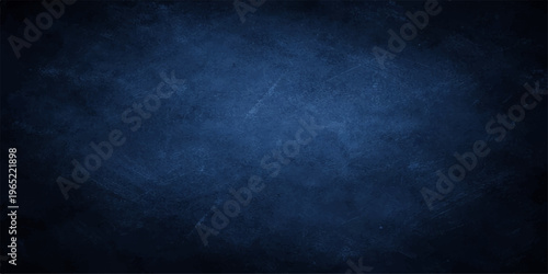 Vintage dark blue grunge wall texture background with an aged black chalkboard pattern and empty paper design for a textured blank backdrop