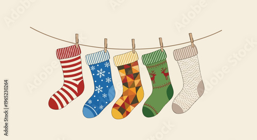 Five colorful Christmas stockings hang on a clothesline