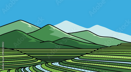Lush green terraced fields descend towards a winding water channel with distant, rolling mountains under a clear blue sky