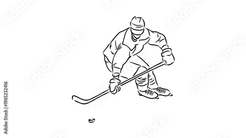 A hockey player in action with a stick and puck on ice