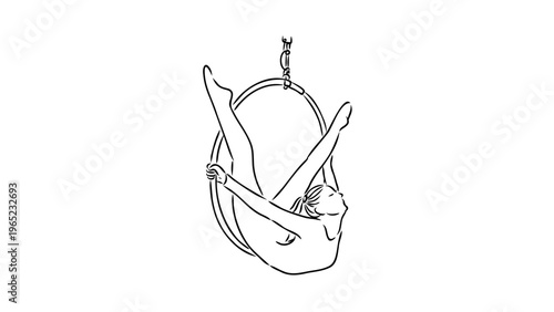 A woman performing aerial yoga in a circular swing