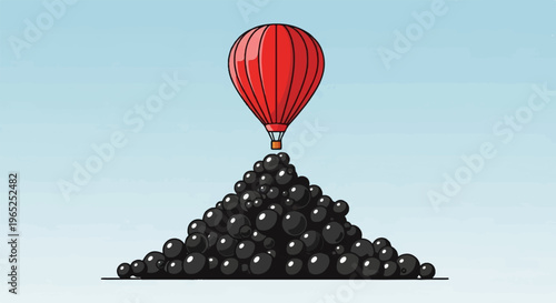 Red hot air balloon ascends from a large pile of black spherical objects