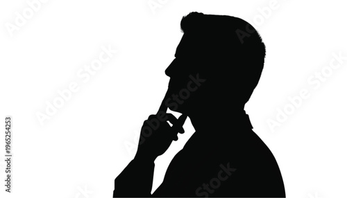 Silhouette of a thoughtful man with finger near mouth indicates consideration or deep planning.