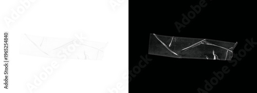 Crisscross pattern of white transparent tape on black background