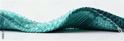 Professional fabric, textile, weave, texture, teal visual with golden hour lighting, balanced composition, realistic lighting, suitable for editorial use, marketing materials, digital design and comme