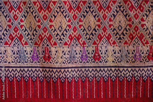 Close up traditional Thai woven fabric patterns beautiful background.