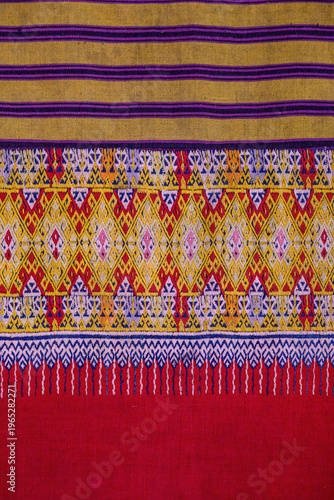 Close up traditional Thai woven fabric patterns beautiful background.