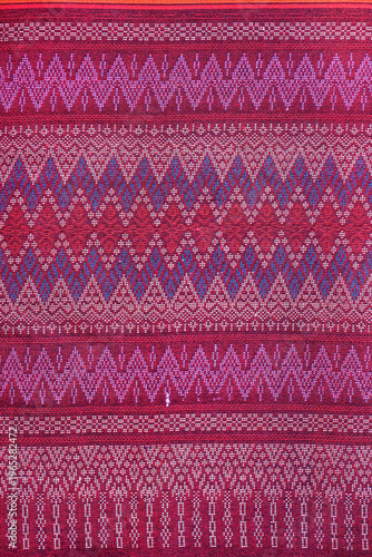 Close up Thai sarong woven fabric patterns beautiful background.