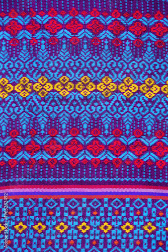 Close up Thai sarong woven fabric patterns beautiful background.