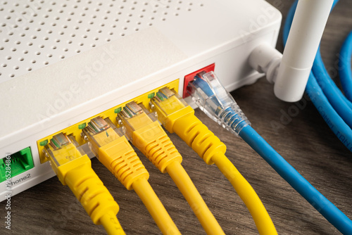 Ethernet cable with wireless router connect to internet service provider network.